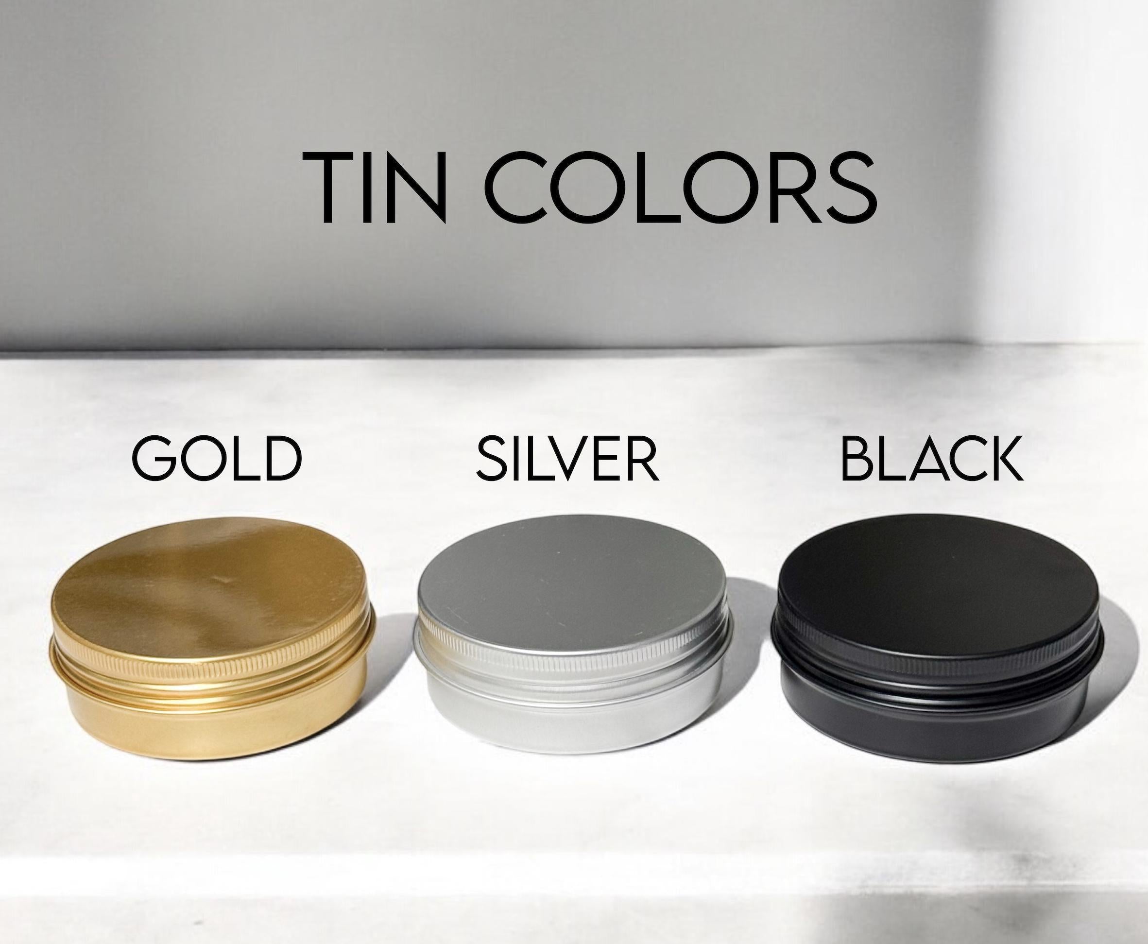 Three 2oz tin candle colors: gold, silver, and black, showcased for bulk birthday favors.