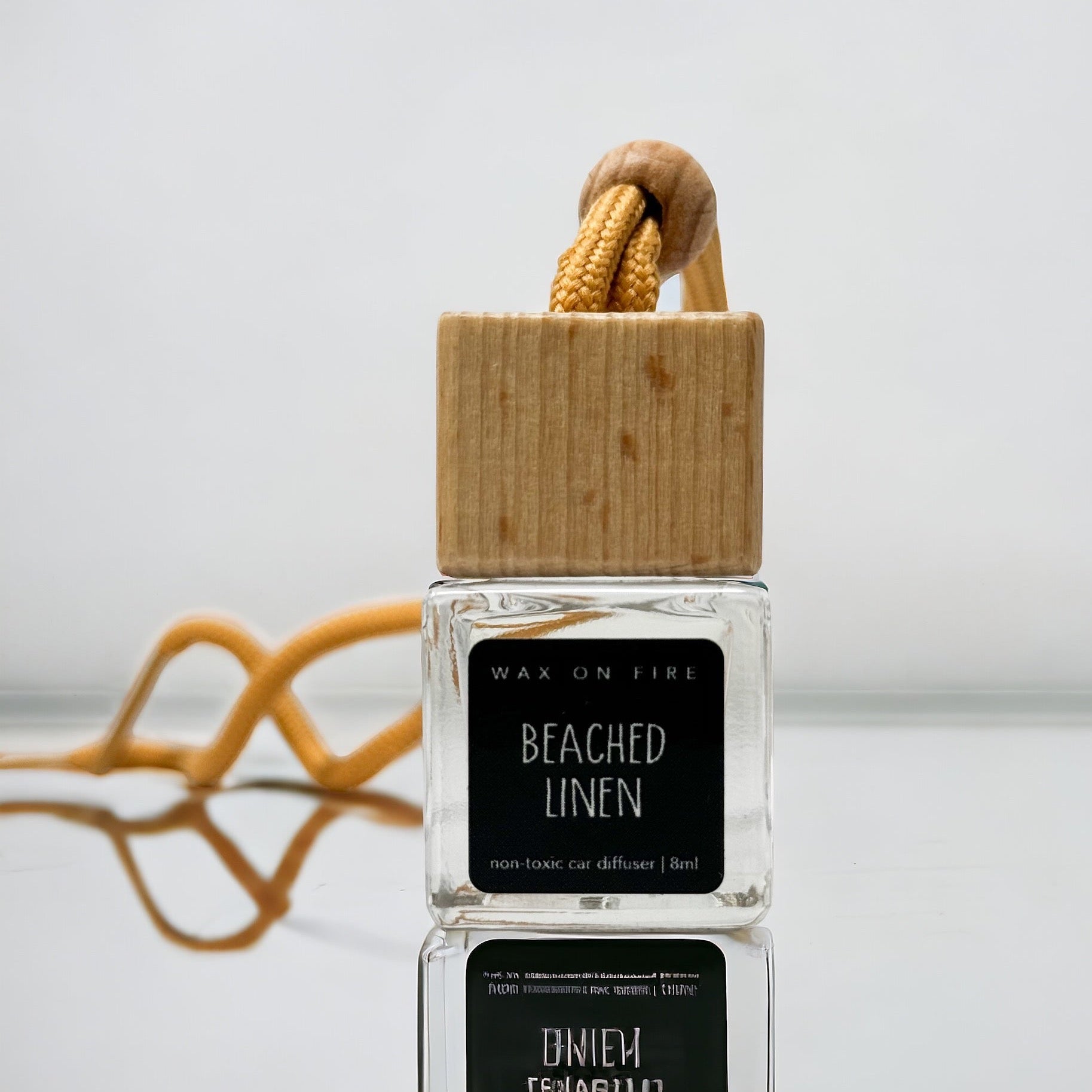 Beached Linen car diffuser, 8ml, handcrafted, non-toxic, elegant design for a sophisticated car interior.