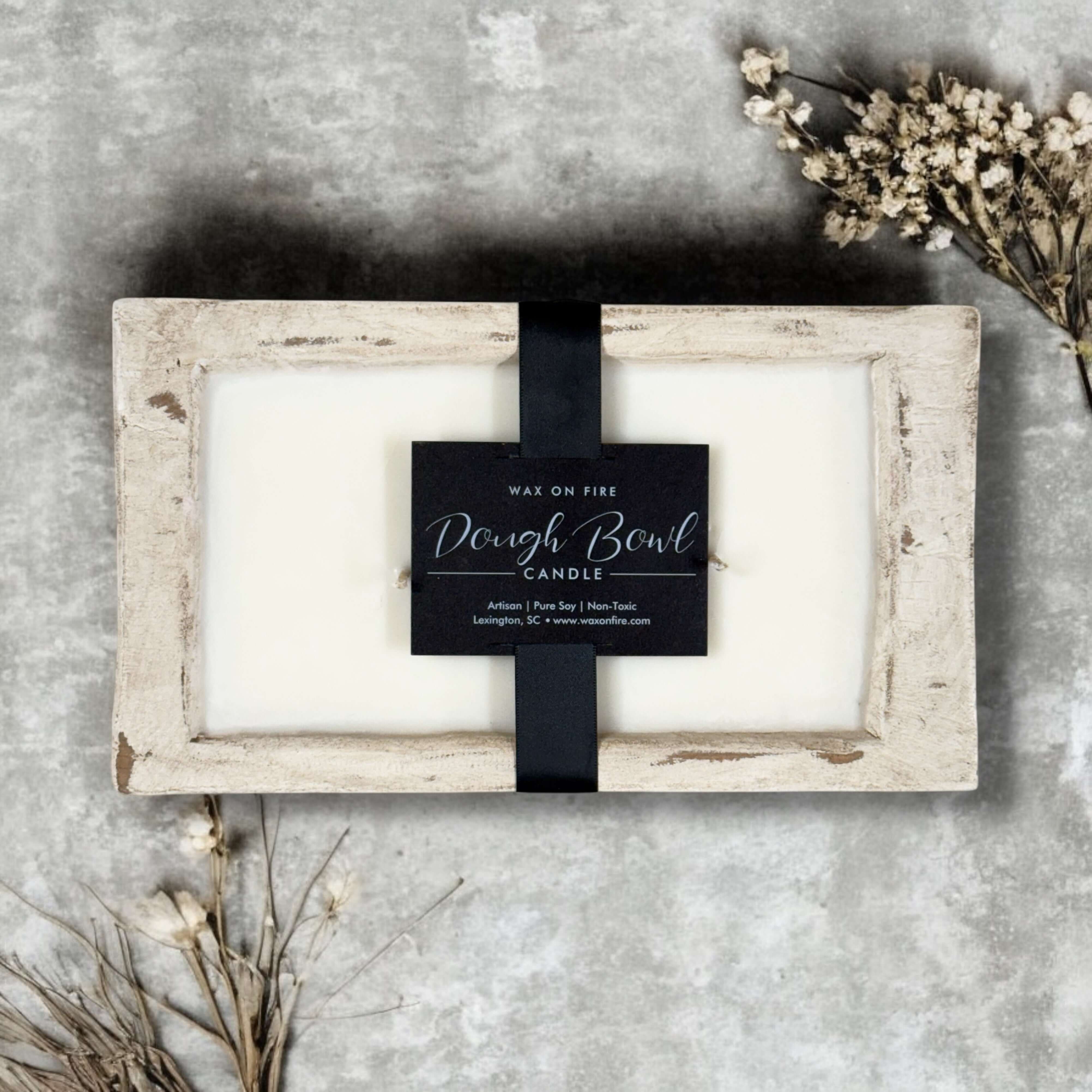 20oz hand-carved dough bowl candle with two cotton wicks, rustic charm, and a cozy farmhouse style.