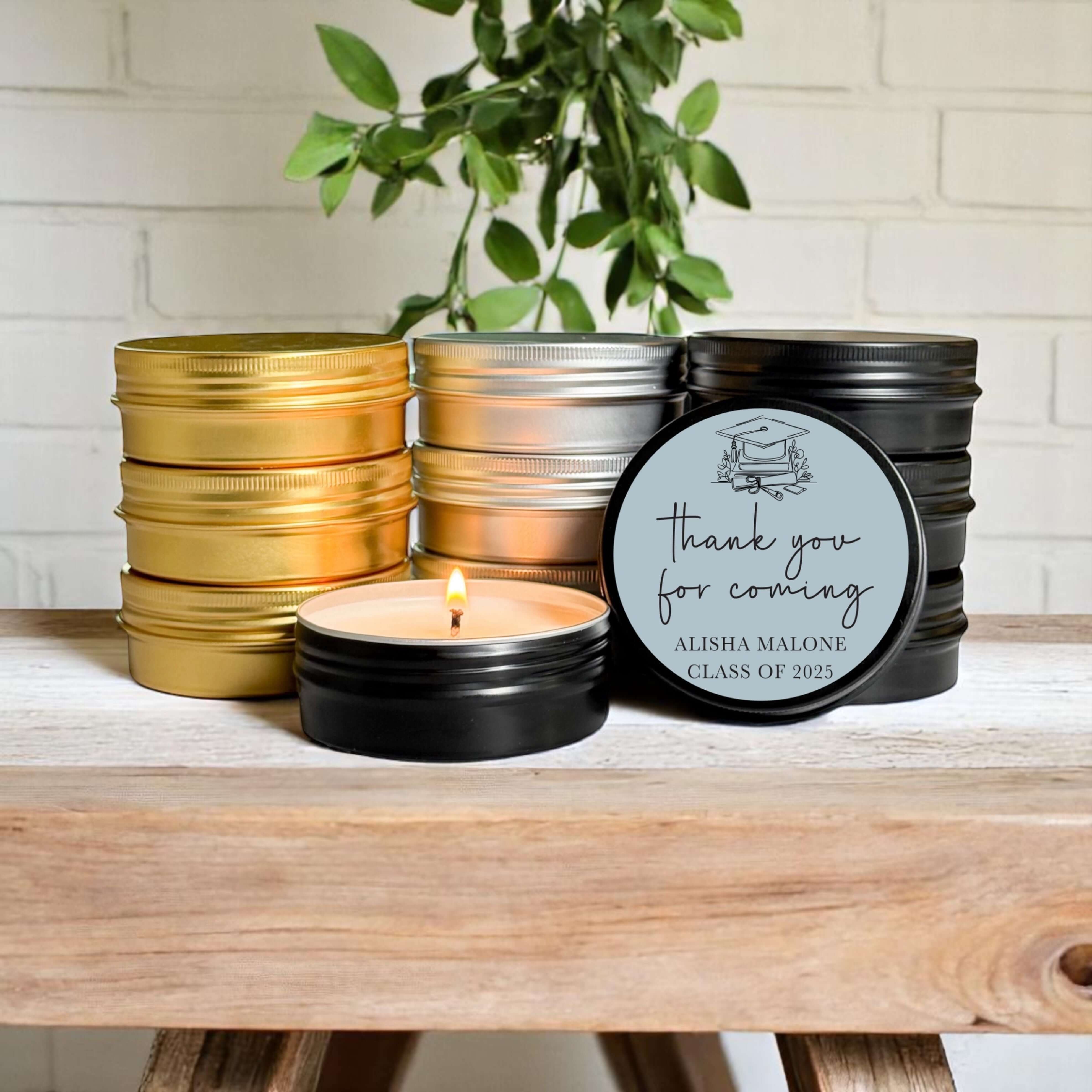 Bulk graduation favors featuring 2oz hand-poured soy wax candles in stylish tins with customizable labels.