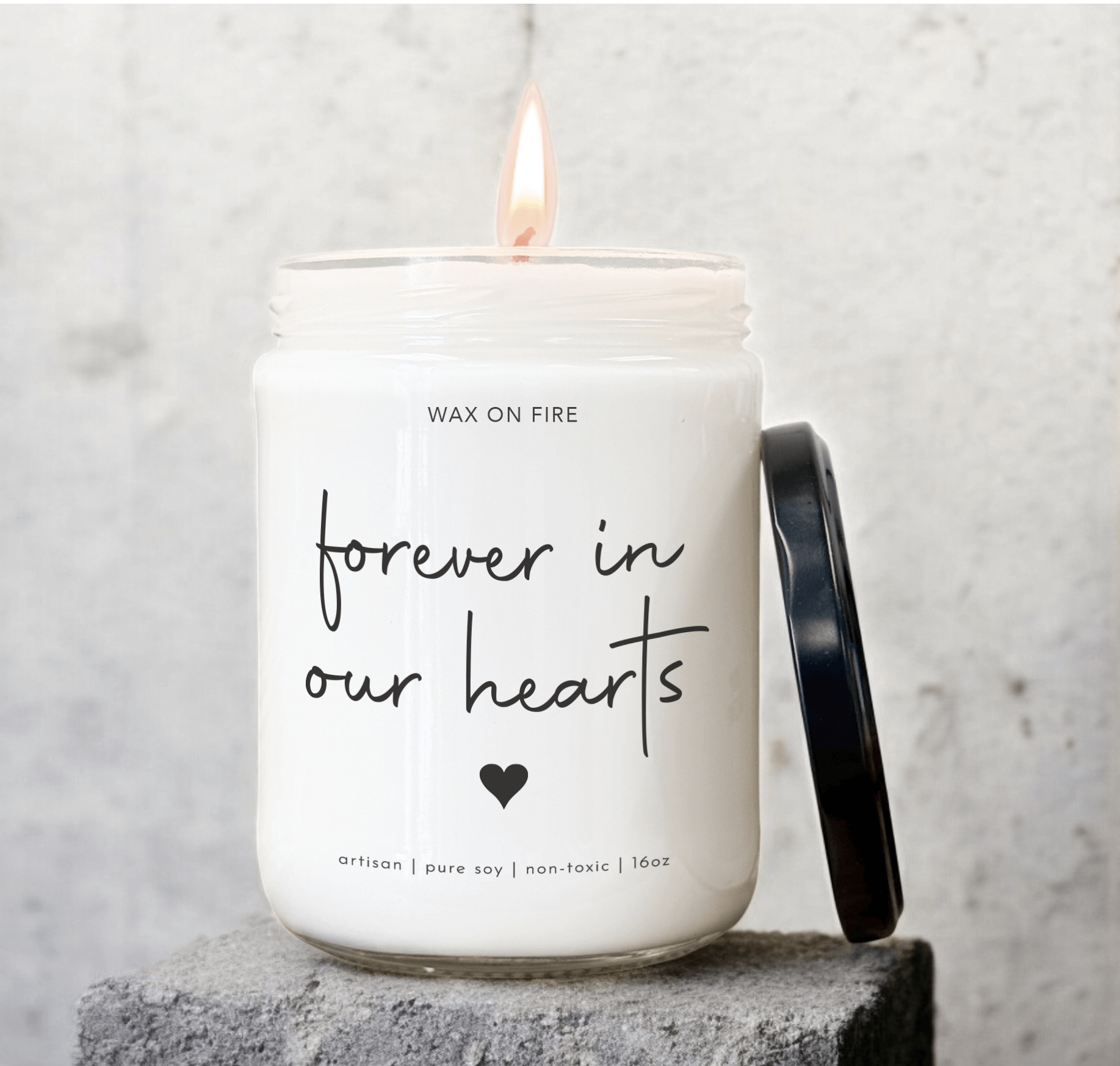 Hand-poured soy candle 'Forever In Our Hearts' with a clean-burning flame and non-toxic label.